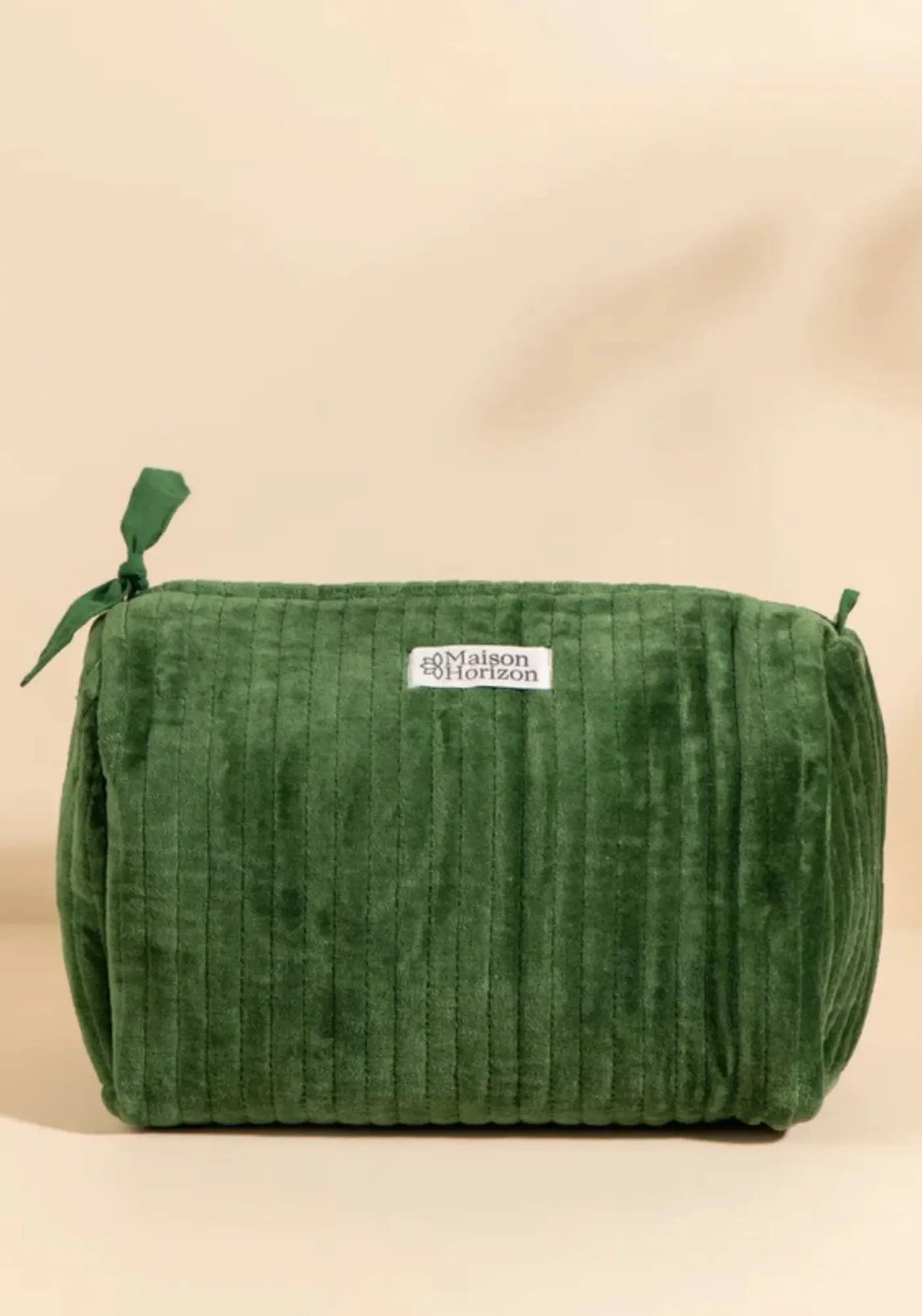 La trousse de toilette Banita velours emeraude de chez Maison Horizon