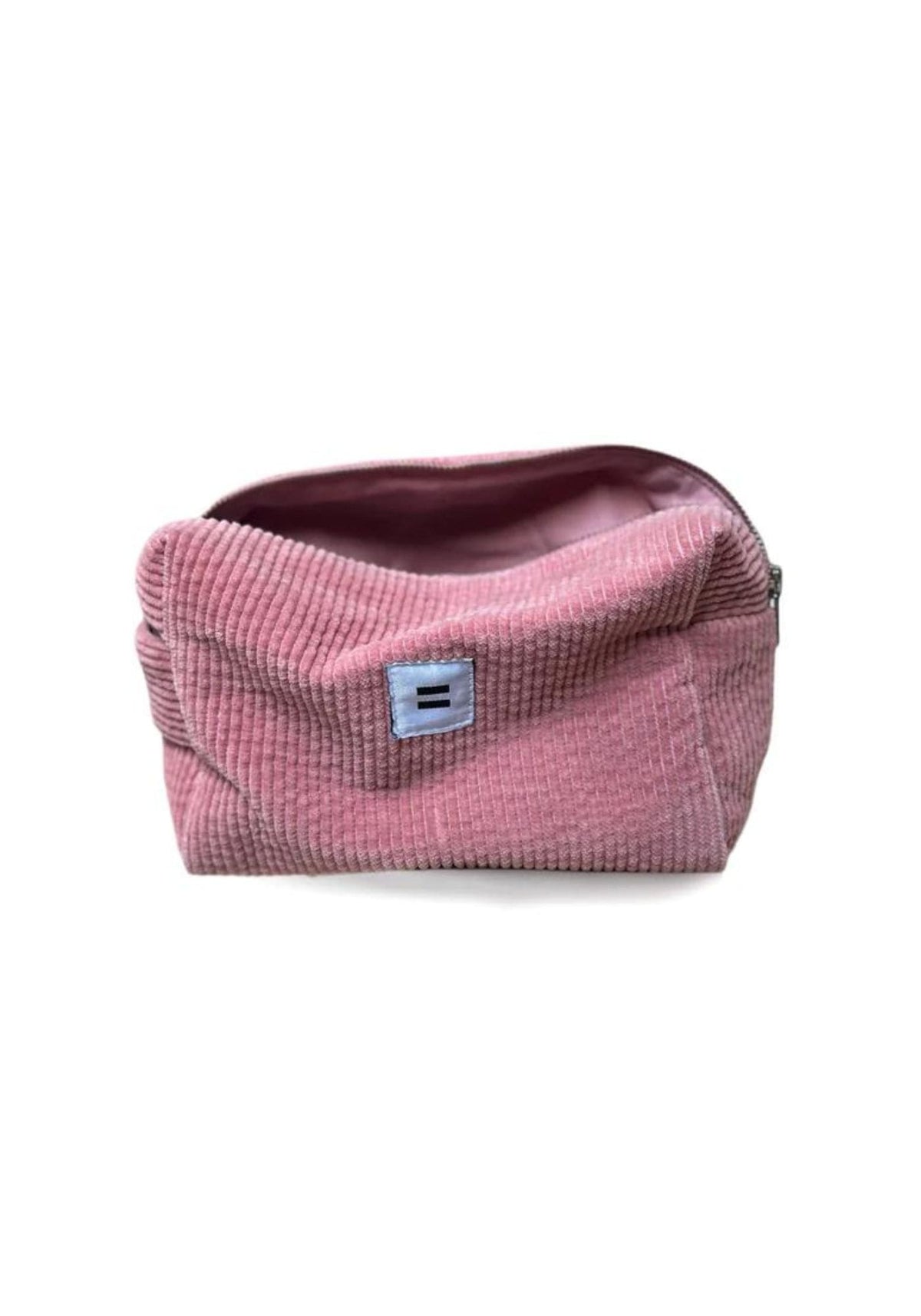 Trousse de toilette en velours rose ouverte de chez Côtelé Paris, vue de face